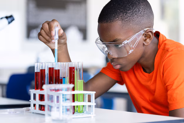 school-boy-conducting-science-experiment-with-test-tubes-classroom_13339-378895